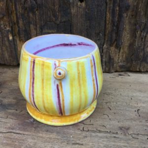 medium round glass yellow and purple stripes